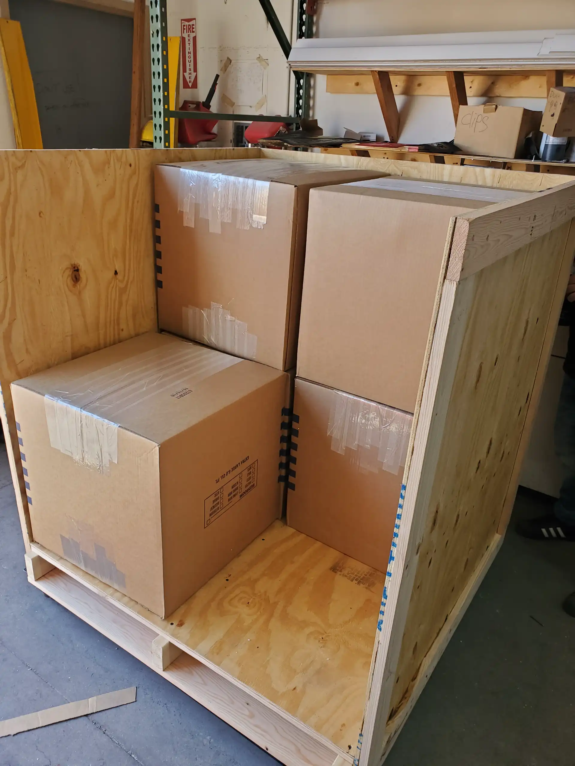 Large custom wooden crate ready for shipment in the warehouse